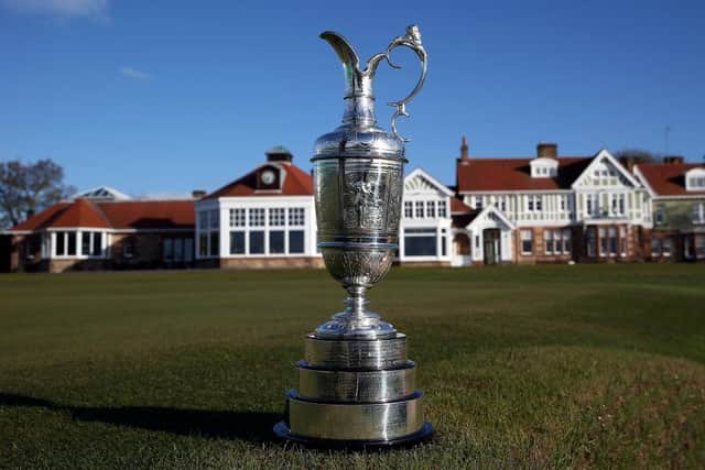 The Claret Jug sits beside the 18th green in front of the clubhouse at Muirfield, where The Open was last held in 2013. Picture: Ross Kinnaird/Getty Images.