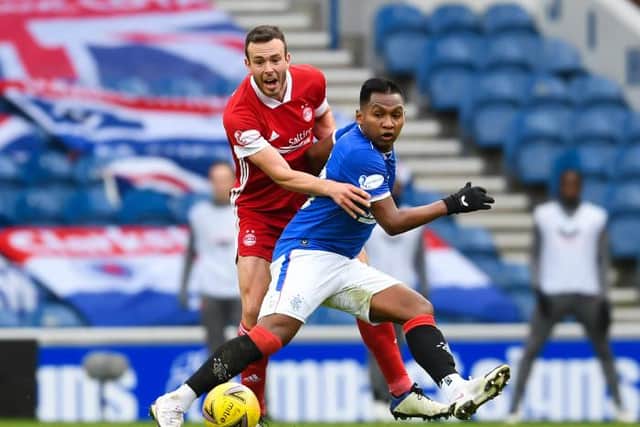 Rangers' Alfredo Morelos (R) and Aberdeen's Andrew Considine during a Scottish Premiership match between Rangers and Aberdeen at Ibrox Stadium, on November 22, 2020, in Glasgow, Scotland (Photo by Craig Foy / SNS Group)