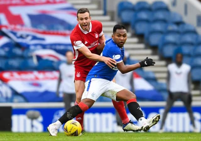 Rangers' Alfredo Morelos (R) and Aberdeen's Andrew Considine during a Scottish Premiership match between Rangers and Aberdeen at Ibrox Stadium, on November 22, 2020, in Glasgow, Scotland (Photo by Craig Foy / SNS Group)