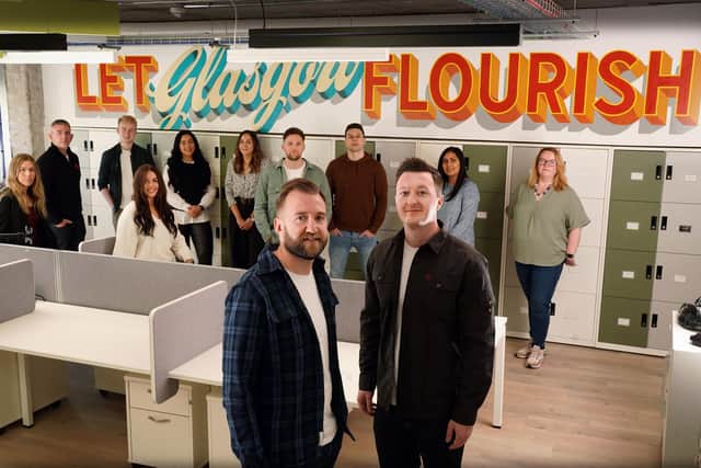Gigged.AI co-founders Rich Wilson and Craig Short with staff members at the company's Glasgow hub. Picture: Stewart Attwood