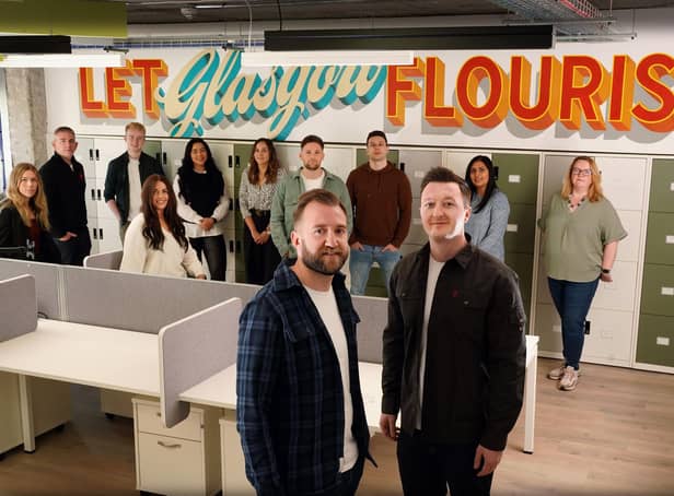 Gigged.AI co-founders Rich Wilson and Craig Short with staff members at the company's Glasgow hub. Picture: Stewart Attwood