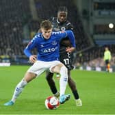 Everton's Nathan Patterson holds off Boreham Wood's Jacob Mendy during the English FA Cup 5th round tie between Everton and Boreham Wood at Goodison Park. Photo by Jon Super/AP/Shutterstock (12832490b)
