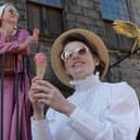 Catriona Peattie and Rachael Tumbarello enjoy an elderflower and lemon curd cone at the newly-reopened Gladstone's Land.