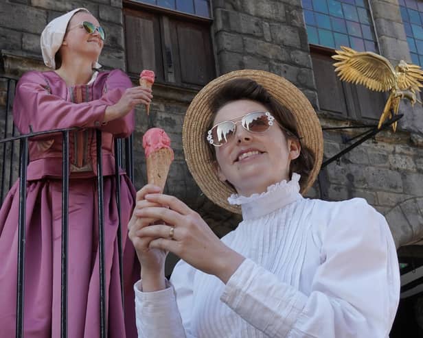 Catriona Peattie and Rachael Tumbarello enjoy an elderflower and lemon curd cone at the newly-reopened Gladstone's Land.