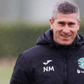 Hibs manager Nick Montgomery cracks a smile during a training session. (Photo by Ross Parker / SNS Group)