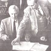 1991 visit: Vladimir Putin (standing) with East Lothian Council chairman George Wanless (left) and Mayor of Leningrad Anatoly Sobchak.