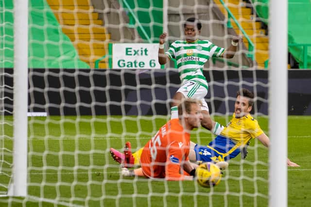 Karamoko Dembele slots the ball past Zdenek Zlamal to make it 4-0 to Celtic.