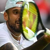 Nick Kyrgios lets his tennis do the talking to progress to the Wimbledon quarter-finals.