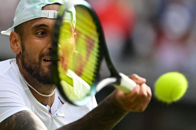 Nick Kyrgios lets his tennis do the talking to progress to the Wimbledon quarter-finals.