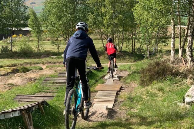 Young people give mountain biking a go thanks to players of the People's Postcode Lottery.