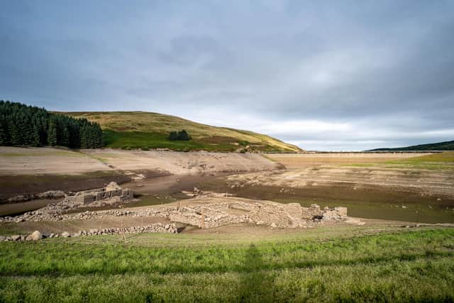 The ruins of the cottage and the stone sheep pens have emerged as water levels in the loch fall away. PIC: Calum Gillies.