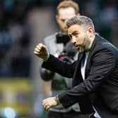 Hibs manager Lee Johnson celebrates on the pitch after the 4-2 win over Celtic. (Photo by Ewan Bootman / SNS Group)