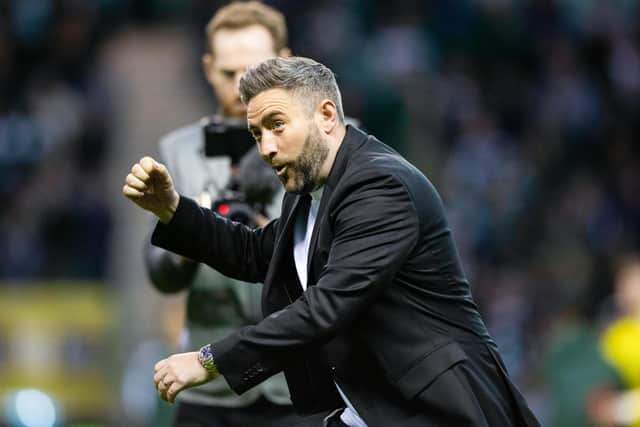 Hibs manager Lee Johnson celebrates on the pitch after the 4-2 win over Celtic. (Photo by Ewan Bootman / SNS Group)