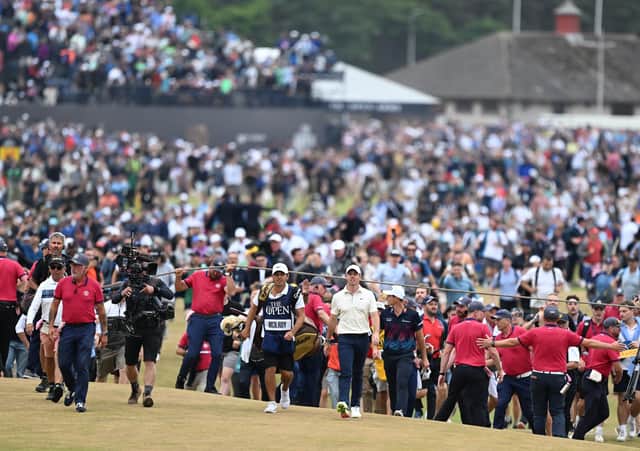 Rory McIlroy and his caddie Harry Diamond walk to the  18th green during the final round of the 150th Open at St Andrews. Picture: Ian Rutherford.