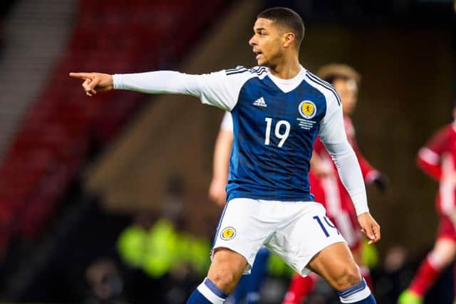 Liam Bridcutt, pictured in action for Scotland against Denmark at Hampden in 2016, is a Lincoln City team-mate of Lewis Fiorini (Photo by Alan Harvey/SNS Group).
