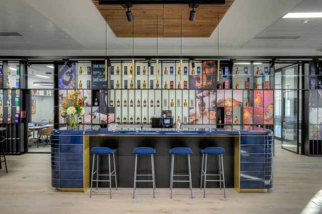A notable design feature in the new-look Chivas Brothers Glasgow HQ is the bespoke wonder wall which celebrates the core brands and acts as a backdrop for the lounge. Picture: Renzo Mazzolini Photography