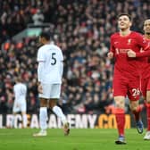 Andy Robertson celebrates Liverpool's second goal against Brentford after his cross was converted by Alex Oxlade-Chamberlain. (Photo by Michael Regan/Getty Images)