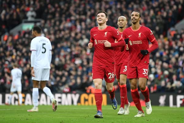 Andy Robertson celebrates Liverpool's second goal against Brentford after his cross was converted by Alex Oxlade-Chamberlain. (Photo by Michael Regan/Getty Images)