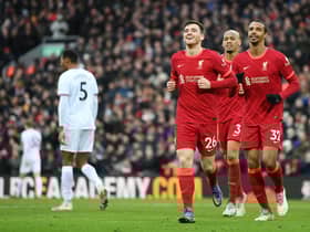 Andy Robertson celebrates Liverpool's second goal against Brentford after his cross was converted by Alex Oxlade-Chamberlain. (Photo by Michael Regan/Getty Images)