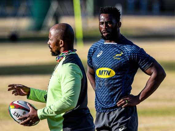 Springboks assistant coach Mzwandile Stick, left, with captain Siya Kolisi who will miss the South Africa A match against the Lions after testing positive for Covid.
