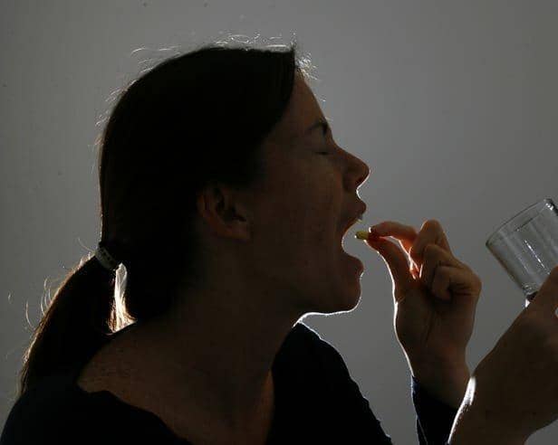 A woman taking 'at-home' abortion medication. The British Pregnancy Advisory Service (BPAS) said the cost of living crisis is impacting the rates of abortion in Scotland.