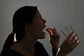 A woman taking 'at-home' abortion medication. The British Pregnancy Advisory Service (BPAS) said the cost of living crisis is impacting the rates of abortion in Scotland.