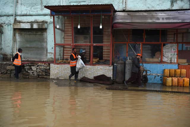 A flooded roadside after drought was followed by torrential rains that saw a number of homes washed away in Kabul in 2019 (Picture: Wakil Kohsar/AFP via Getty Images)