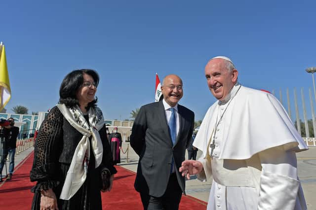 Iraq's President Barham Saleh and his wife Sarbagh bid farewell to Pope Francis at Baghdad International Airport (Picture: Vatican Media/AFP via Getty Images)