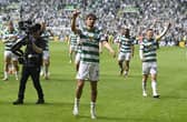 Matt O'Riley, centre, and captain Callum McGregor lead the celebrations after defeating Rangers 2-1 at Parkhead.