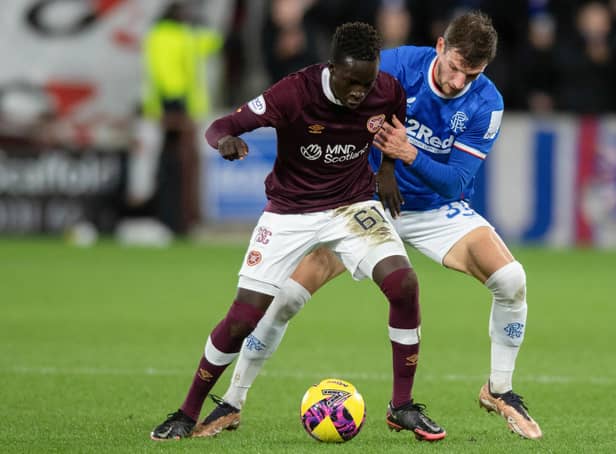 Hearts' Garang Kuol holds off Rangers' Borna Barisic during the match at Tynecastle. (Photo by Mark Scates / SNS Group)