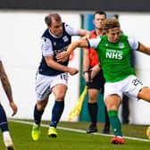 Dundee's Paul McGowan and Hibs' Sean Mackie  (Photo by Paul Devlin / SNS Group)