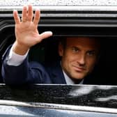 France's president Emmanuel Macron waves as he leaves after casting his vote in the second stage of French parliamentary elections at a polling station in Le Touquet, northern France on Sunday. Picture: AFP via Getty Images