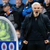 Aberdeen manager Jim Goodwin shouts from the touchline.