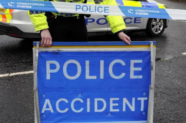 A motorist is fighting for his life after a car crash which also left one passenger seriously injured and another needing hospital treatment.