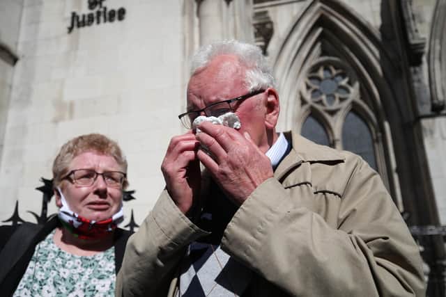 Former post office worker Noel Thomas, who was convicted of false accounting in 2006, celebrates with his daughter Sian outside the Royal Courts of Justice (Photo: Yui Mok/PA Wire/PA Images)