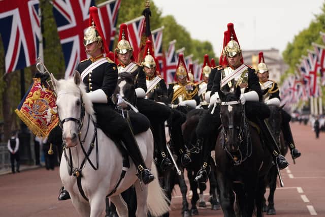 Members of the Household Cavalry in The Mall, central London, ahead of the ceremonial procession of the coffin of Queen Elizabeth II from Buckingham Palace to Westminster Hall, London. Picture date: Wednesday September 14, 2022.