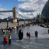 Mourners queuing to pay their respects to the Queen lying in state in Westminster Hall stretching past Tower Bridge nearly three miles away on Friday. Picture: Ian West/PA Wire