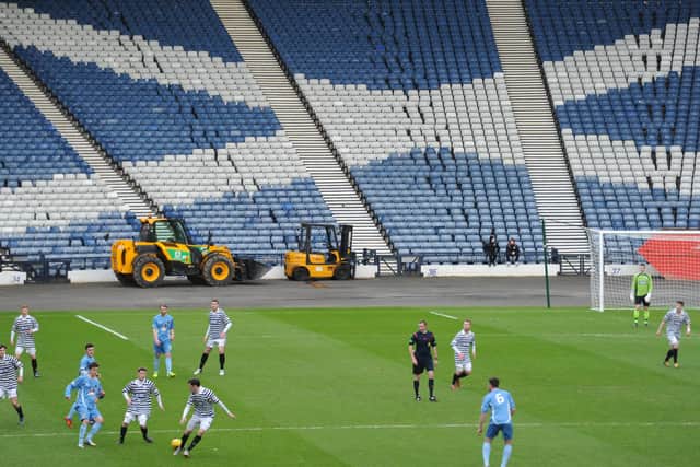 Queen's Park play a League Two match v Berwick Rangers at Hampden Park in 2016 - today could be their last-ever match at the stadium.