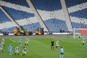 Queen's Park play a League Two match v Berwick Rangers at Hampden Park in 2016 - today could be their last-ever match at the stadium.