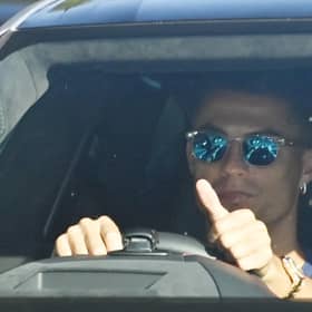 Manchester United's new signing Cristiano Ronaldo arrives to attend a training session at the Carrington. (Photo by PAUL ELLIS/AFP via Getty Images)