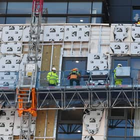 Work is carried out to remove dangerous cladding on a Glasgow high-rise building. Picture: John  Devlin
