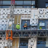 Work is carried out to remove dangerous cladding on a Glasgow high-rise building. Picture: John  Devlin