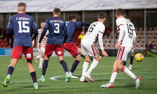 Kilmarnock's Chris Stokes (centre) makes it 2-1 during a Cinch Championship match between Hamilton and Kilmarnock at the Fountain of Youth Stadium, on December 26, 2021, in Hamilton, Scotland (Photo by Sammy Turner / SNS Group)