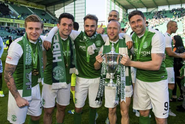 Celebrating Hibs winning the Championship with his Nando's and Starbucks regulars