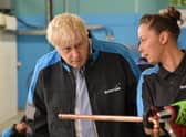 Boris Johnson's plans for a bridge between Scotland and Northern Ireland will remain under review
