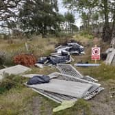 Rubbish including roof panels have been left dumped at Balbithan Woods near Kintore