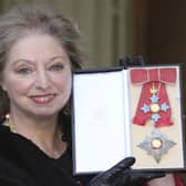 Dame Hilary Mantel holding her Dame Commander of the British Empire medal presented to her for services to literature at an Investiture ceremony at Buckingham Palace in central London. The Wolf Hall writer has died "suddenly yet peacefully" surrounded by close family and friends aged 70, HarperCollins has announced.