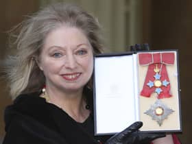 Dame Hilary Mantel holding her Dame Commander of the British Empire medal presented to her for services to literature at an Investiture ceremony at Buckingham Palace in central London. The Wolf Hall writer has died "suddenly yet peacefully" surrounded by close family and friends aged 70, HarperCollins has announced.