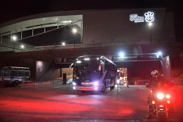 Argentina's football team bus leaves the Neo Quimica Arena, also known as Corinthians Arena, after the suspension of the match.