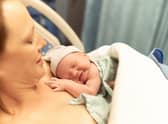 Mother with her new born baby girl in the hospital.